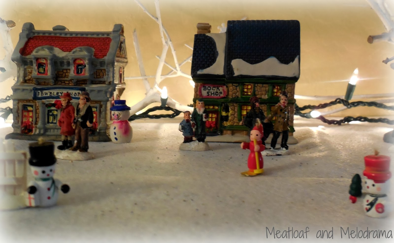 miniature houses snowmen lights
