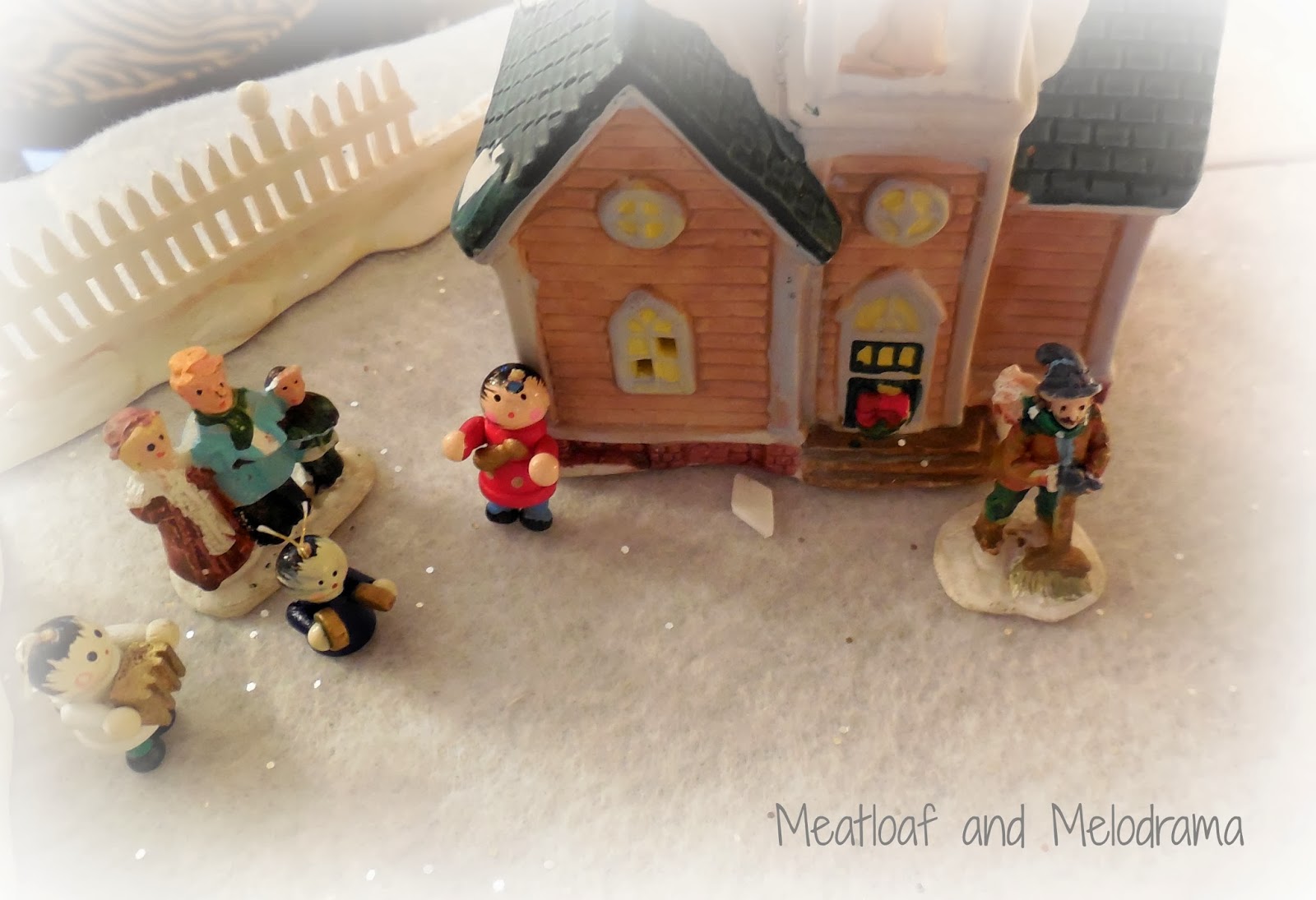 miniature church Christmas village carolers