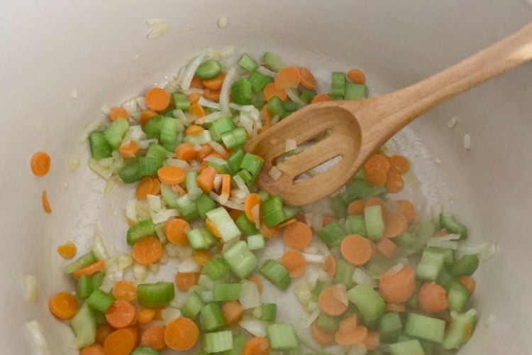 saute onions, celery and carrots in dutch oven