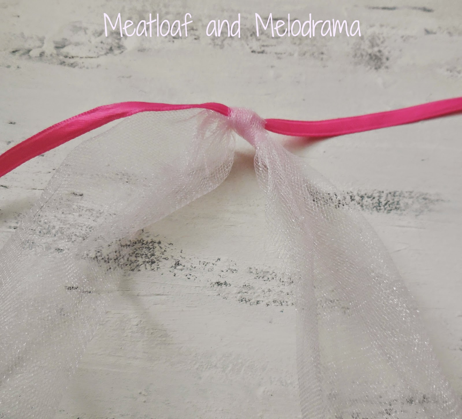tie strips of tulle around a ribbon