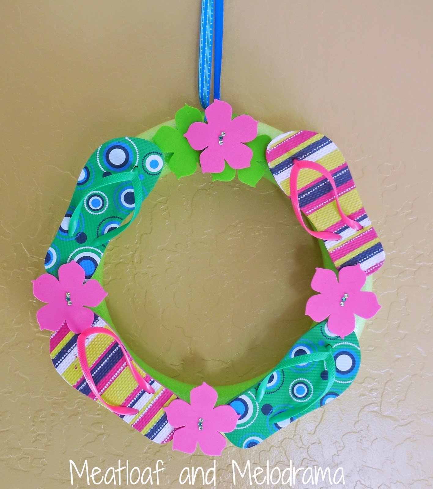 Summer flip flop wreath with flowers on a pool noodle