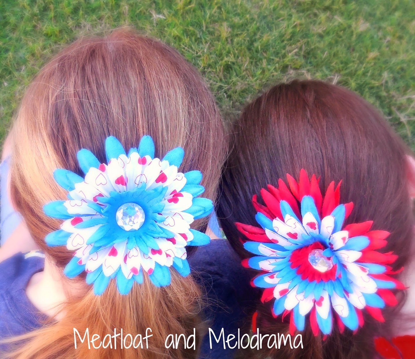 red, white and blue hair flower clips in girls hair
