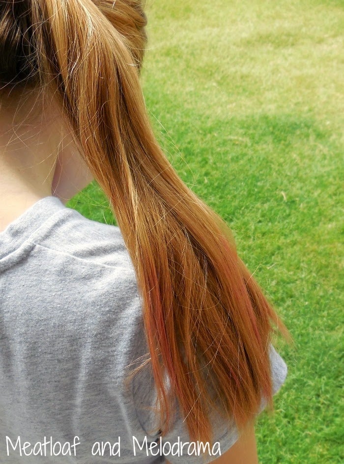 blonde girls with ends of hair dyed with pink food coloring