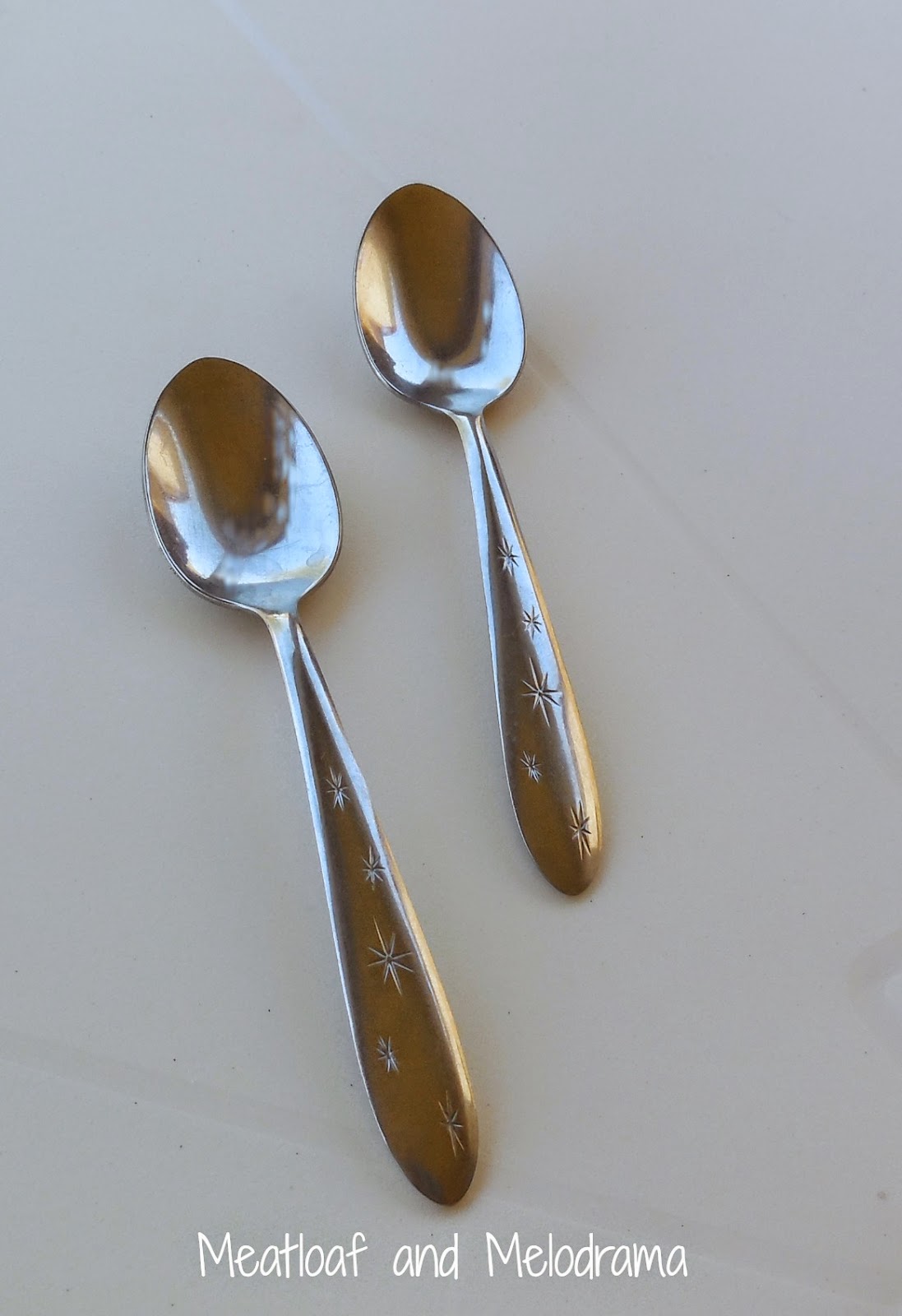 vintage stainless steel spoons starburst pattern