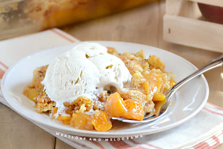 peach cobbler with cake mix topping and ice cream