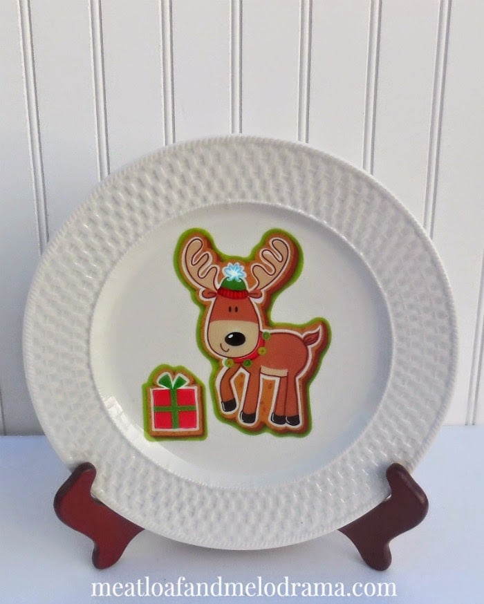 reindeer with present on a white plate for christmas
