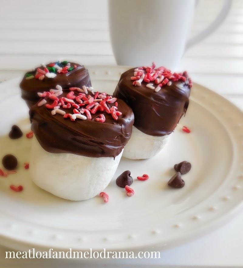 chocolate dipped marshmallows with candy cane sprinkles