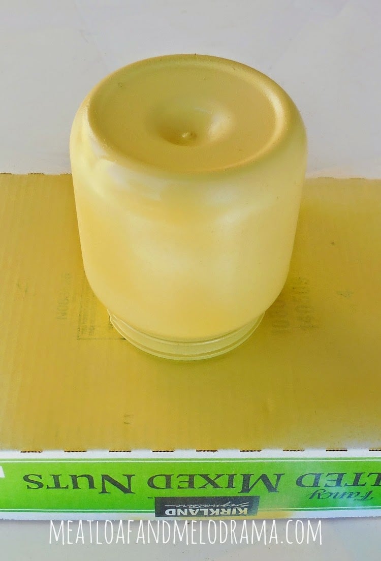 spray paint jar with yellow rust-oleum paint