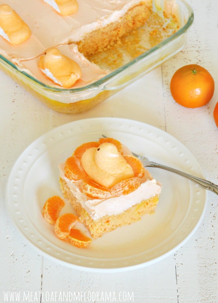 orange creamsicle cake with mandarin orange slices and orange peeps