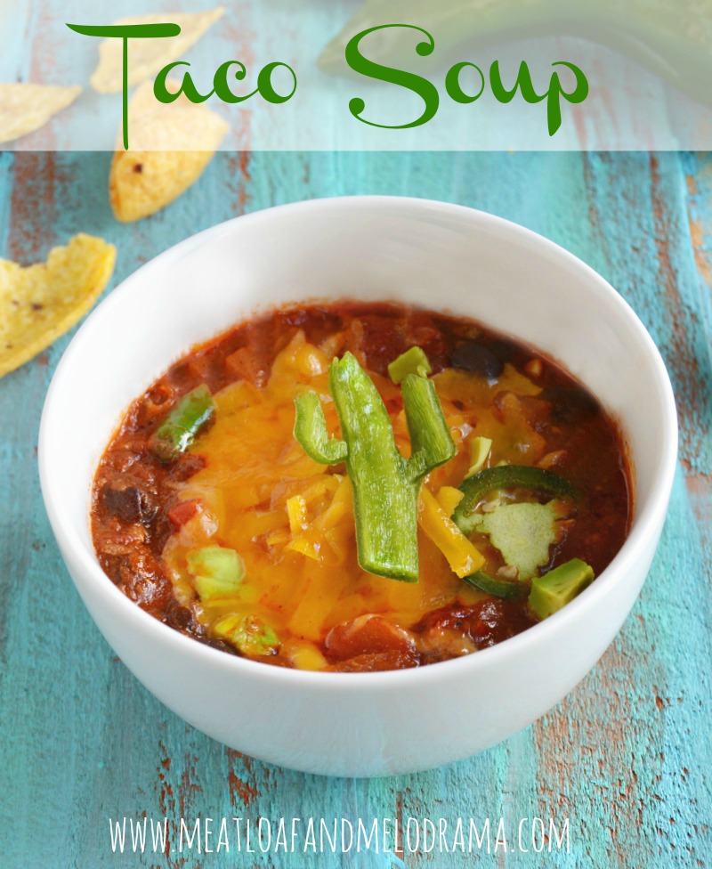taco soup with cheese and fritos and sour cream and peppers