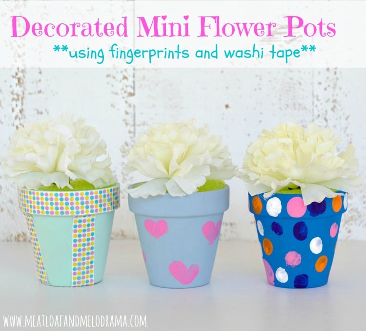 mini terra cotta pots painted and decorated with washi tape and fkids ingerprints