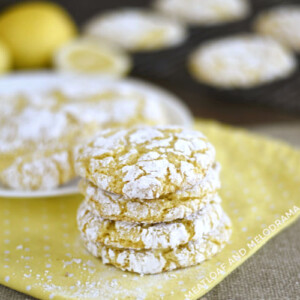 stack of lemon crinkle cookies with powdered sugar