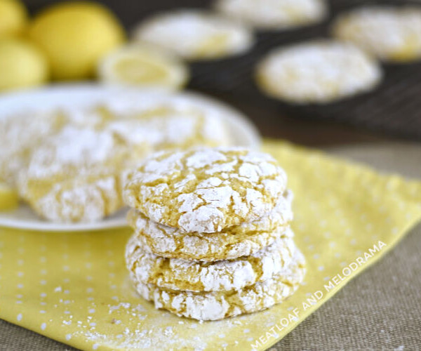 stack of lemon crinkle cookies with powdered sugar