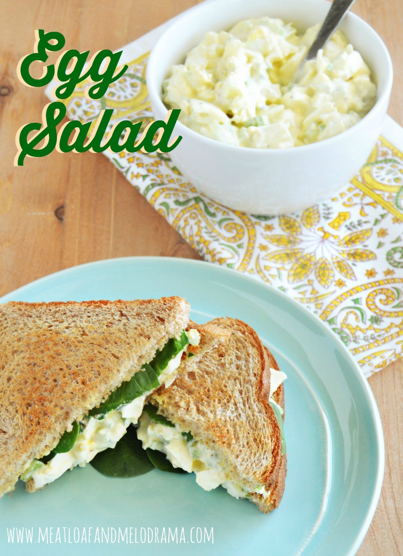 egg salad in a bowl with sandwich