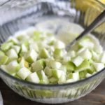mix apples and dressing for chicken salad