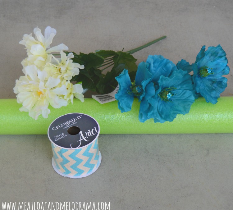 dollar store flowers and pool noodle used to make aqua spring wreath