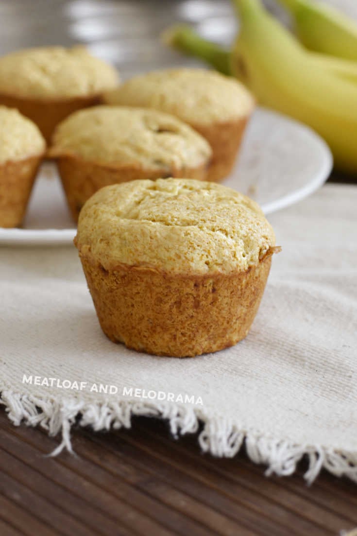 banana muffin on a tan placemat