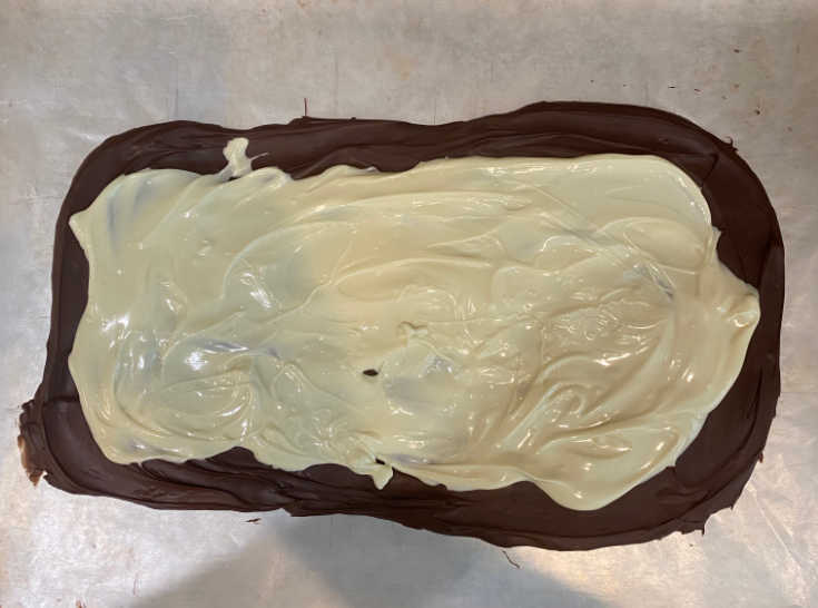 white chocolate layer over dark chocolate