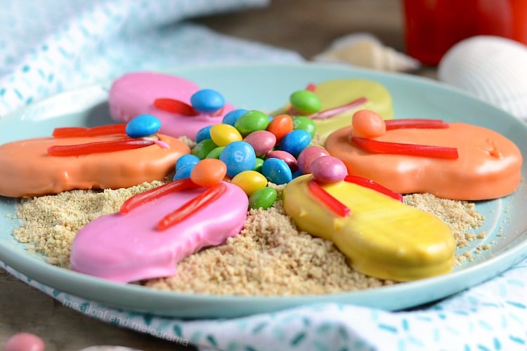 easy flip flop cookies made from nutter butters on plate with skittles and twizzlers