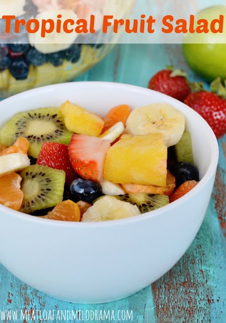 tropical fruit salad with honey lime dressing in a bowl