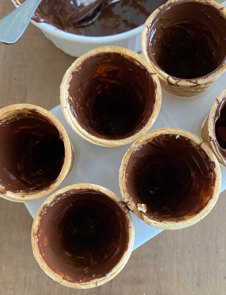 sugar cones with melted chocolate inside