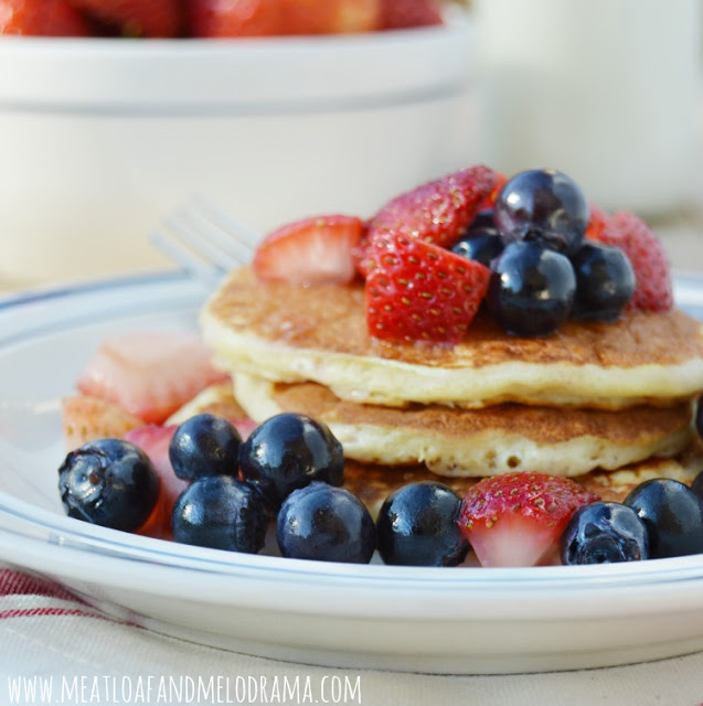 Fourth of July breakfast pancakes with blueberries and strawberries