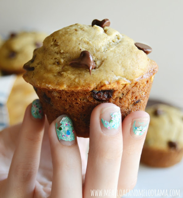 girl holding peanut butter banana chocolate chip muffins