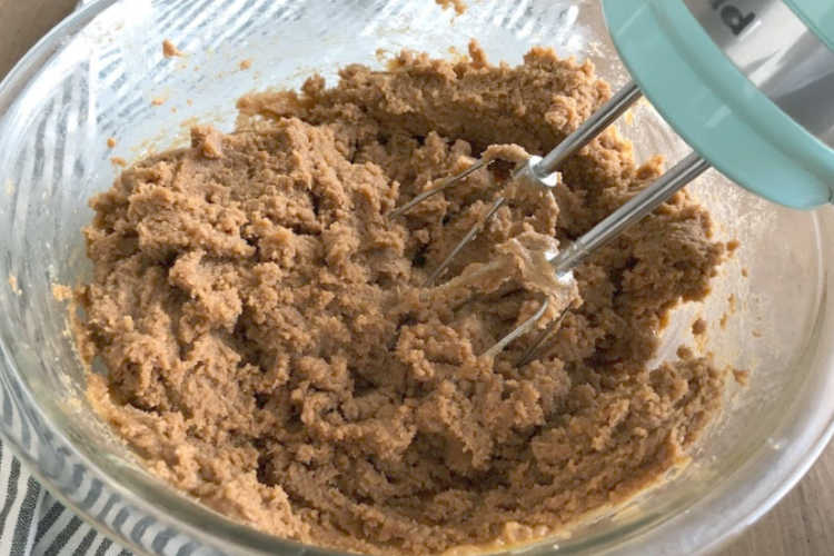 flourless peanut butter cookie dough in a mixing bowl