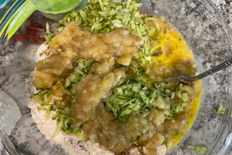 zucchini muffin batter in a bowl