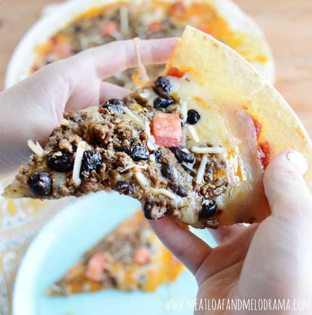 slice of mexican pizza with beef and black beans