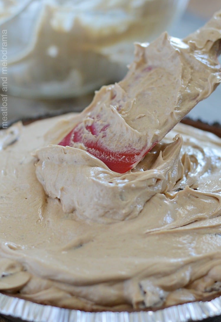 spread peanut butter cream cheese into chocolate pie shell