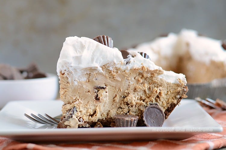 no bake chocolate peanut butter pie with mini peanut butter cups on a plate