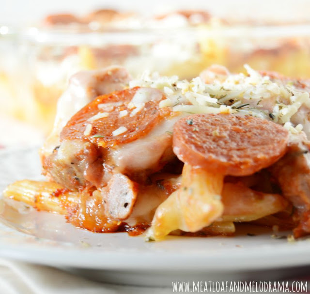 baked penne topped with pasta sauce, cheese and pepperoni and sausage