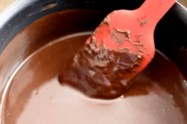 melt chocolate chips in pot on stove