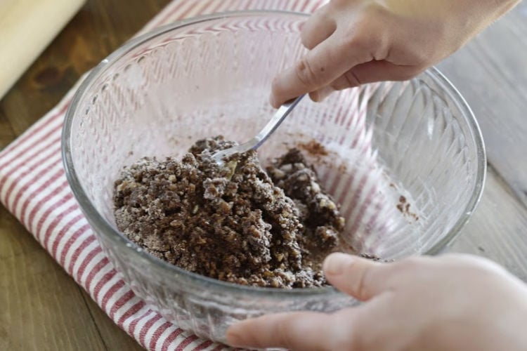 mix ingredients in bowl for bourbon balls