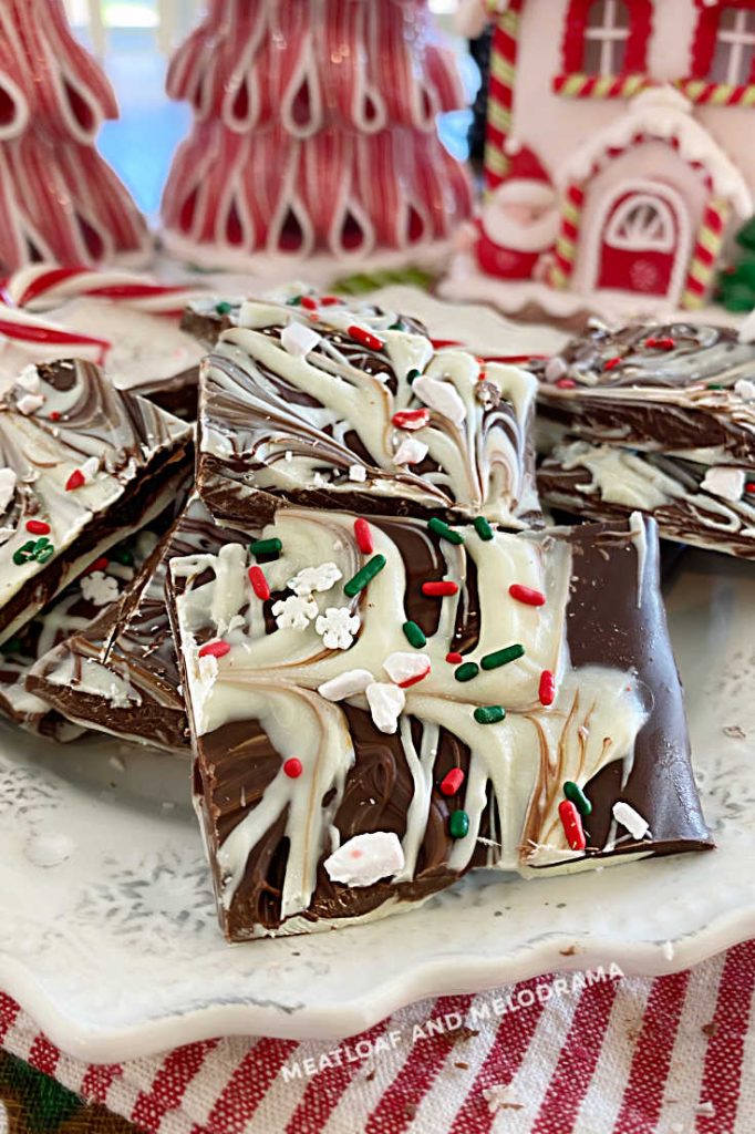 plate of peppermint bark with red and white candies