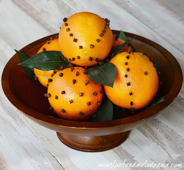 orange-pomander-balls-in-wood-bowl