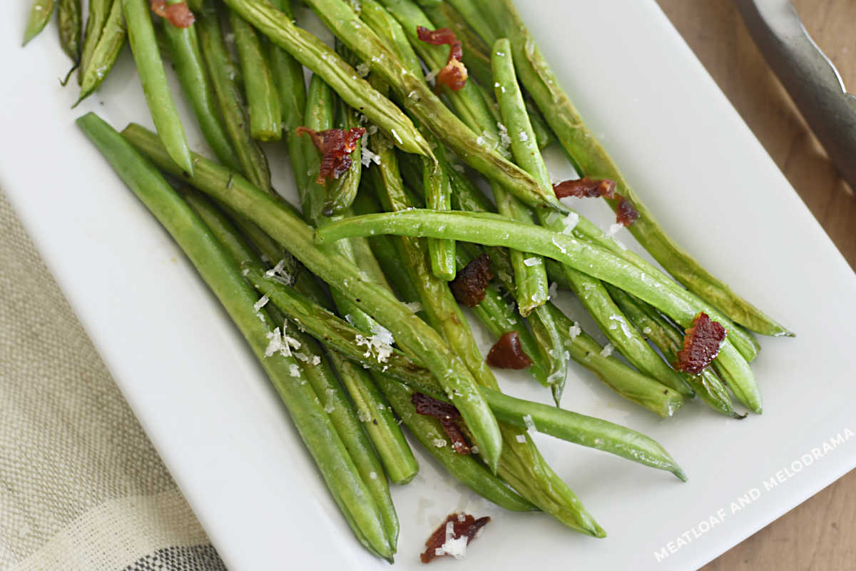 sauteed green with bacon and lemon on serving platter