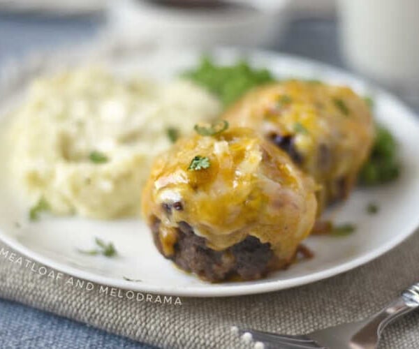 mini meatloaf muffins with cheddar cheese and bbq sauce on a plate