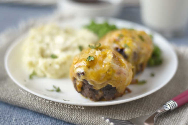 mini meatloaf muffins with cheddar cheese and bbq sauce on a plate
