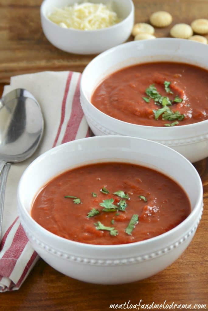 homemade-tomato-soup-with-shredded-cheese-and-crackers