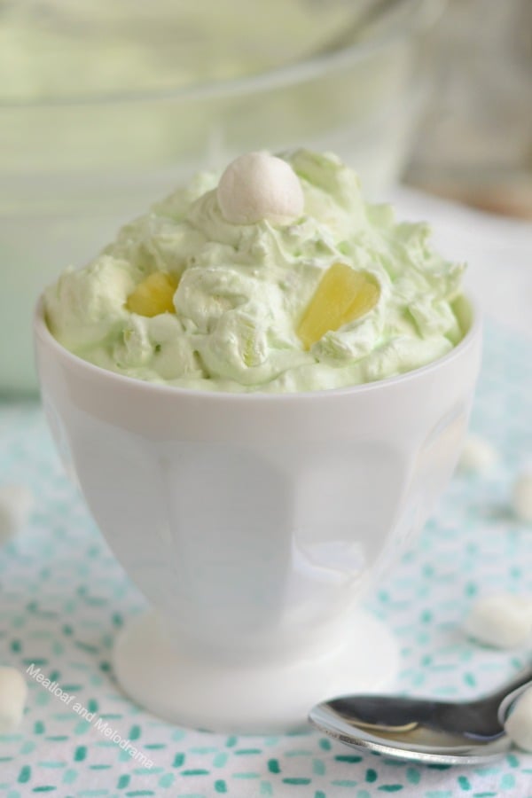 pistachio salad in white bowl with marshmallows