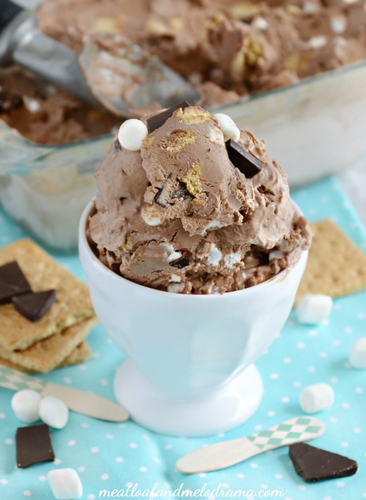 no churn chocolate s'mores ice cream with graham crackers and marshmallows in a white dish