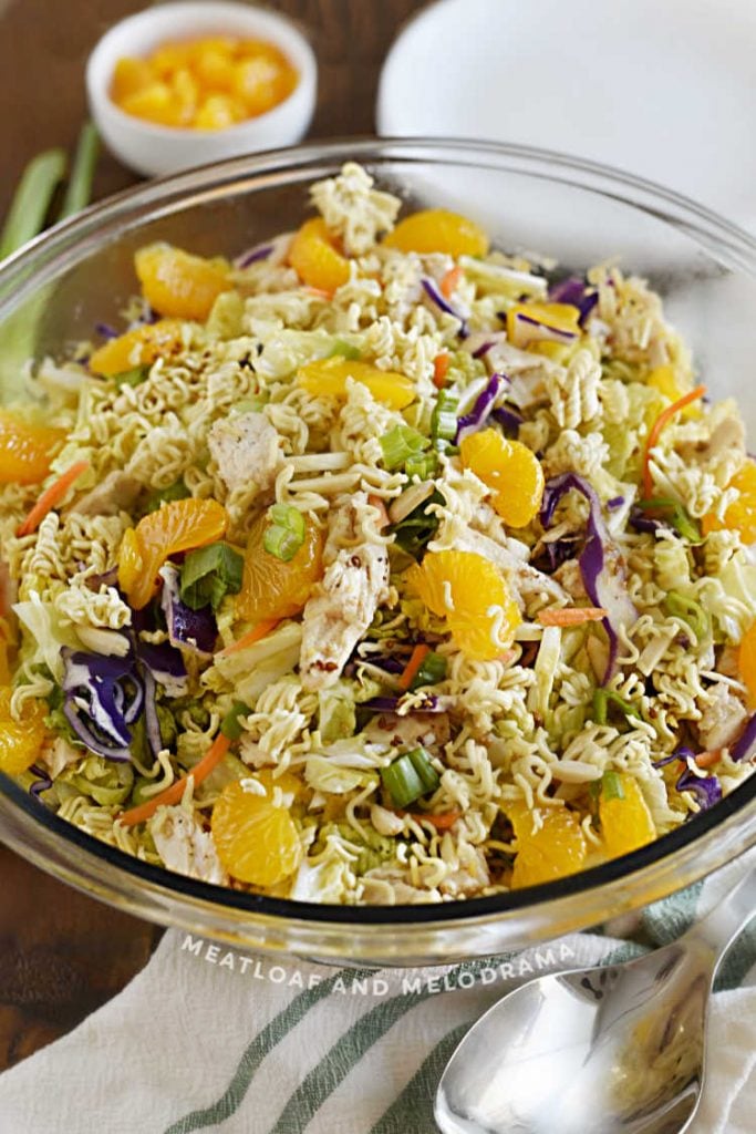 bowl of asian chicken salad with napa cabbage and mandarin oranges