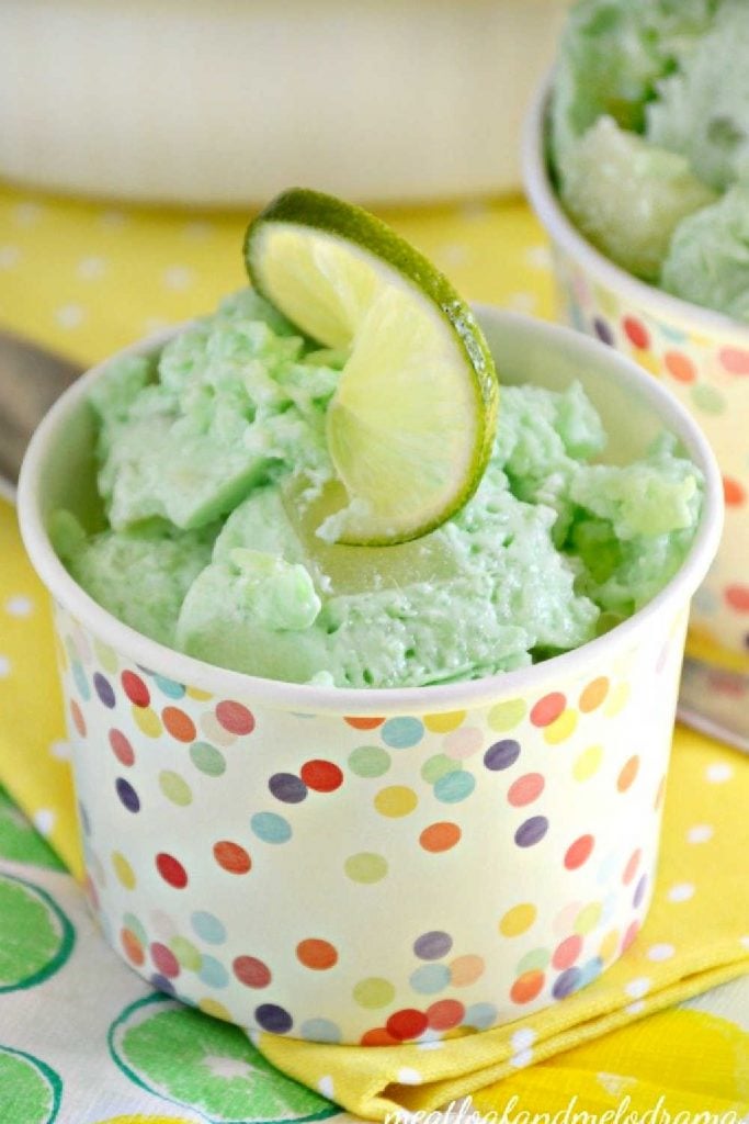 lime gelatin salad with lime slice in polka dot dish