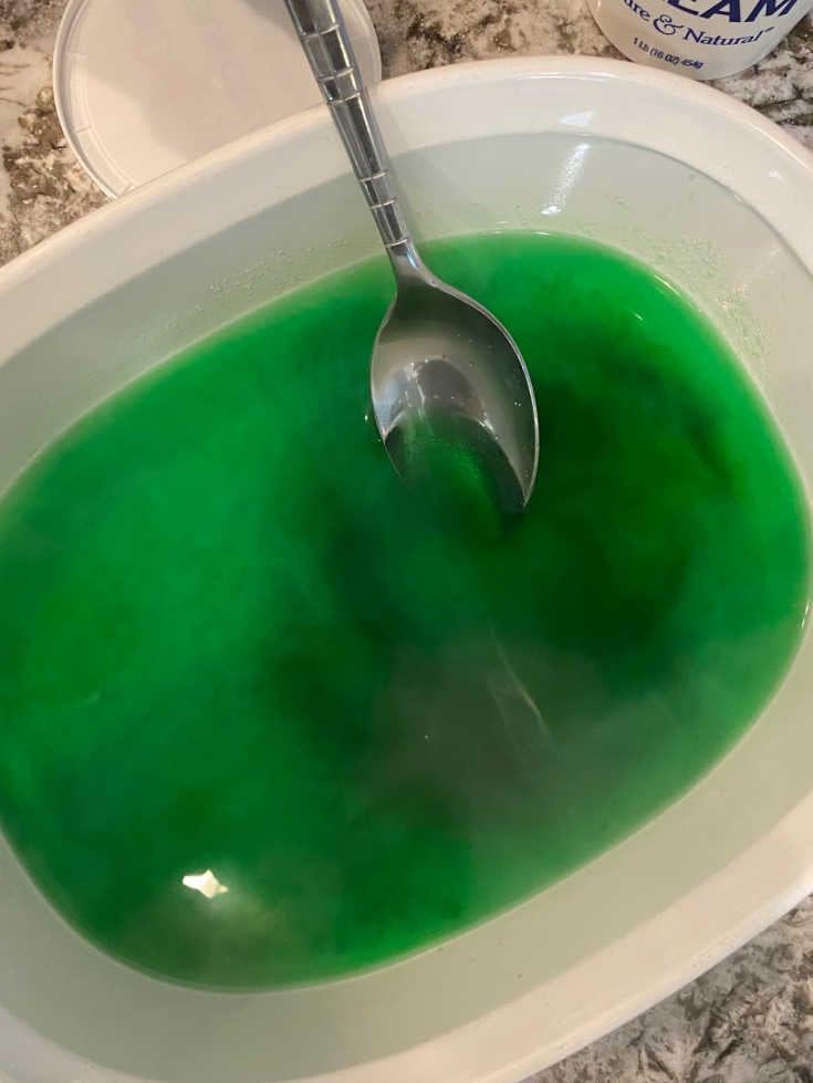 mix lime jello gelatin and water in large serving dish