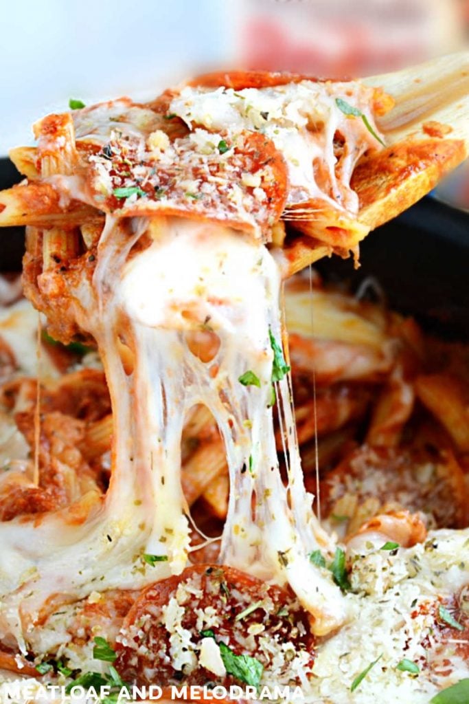penne pasta with stretchy mozzarella cheese