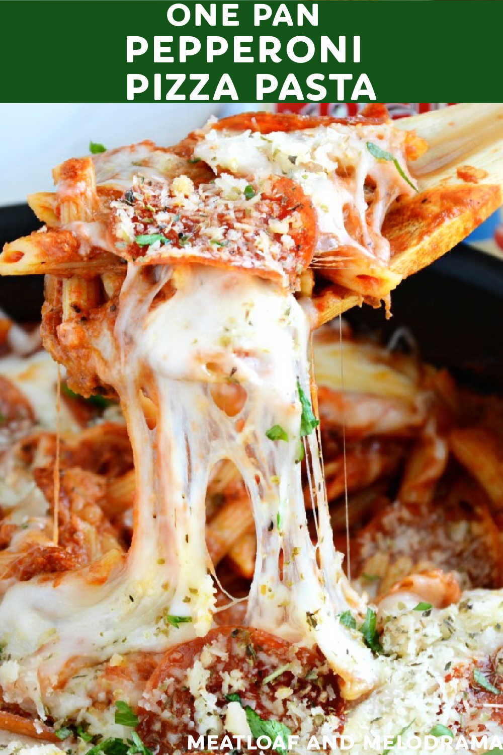 This Pepperoni Pizza Pasta recipe is a super easy dinner you make in just one pan in less than 30 minutes! Kids love this cheesy skillet meal and moms love the easy clean-up! via @meamel