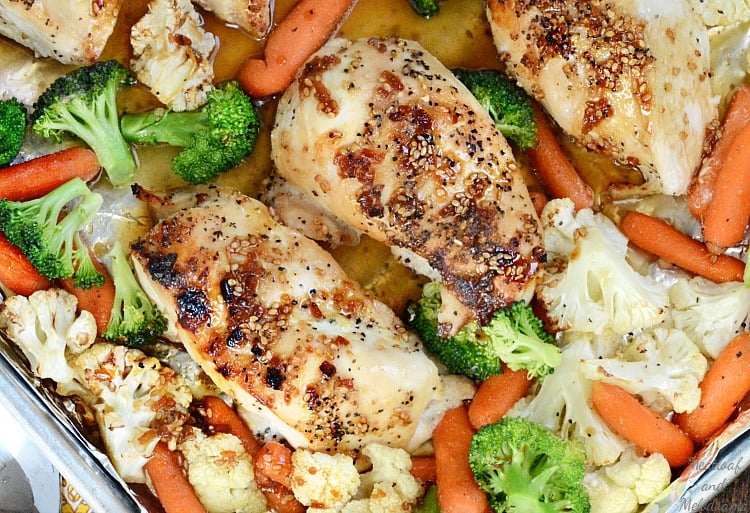 baked sheet pan honey teriyaki chicken breasts with broccoli carrots and cauliflower 