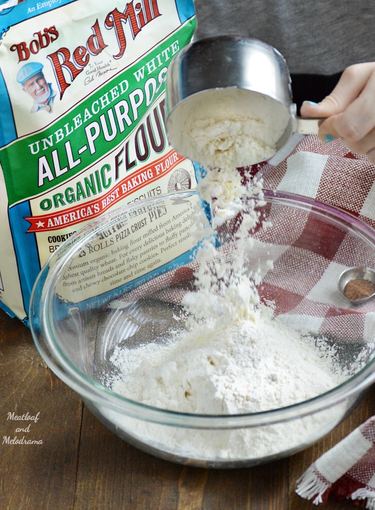 pour flour in mixing bowl.